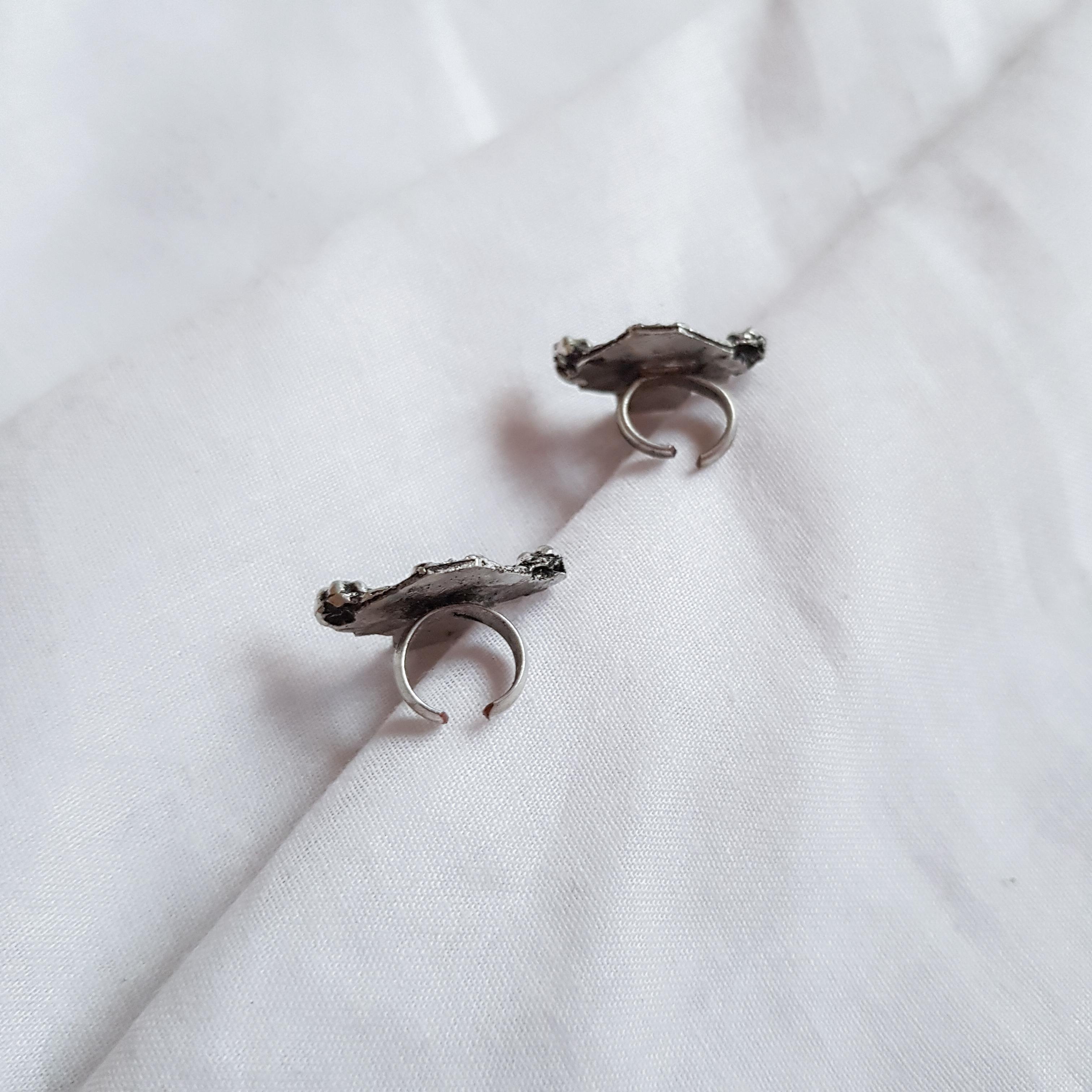 White Peacock Earcuffs image 1